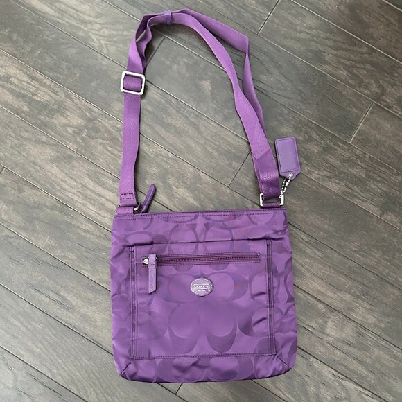 Coach Handbags - Coach Signature Getaway Purple Nylon File Crossbody Handbag  L1380-F77408